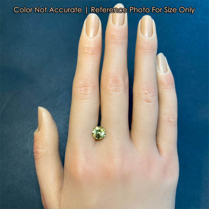 round brilliant garnet on hand