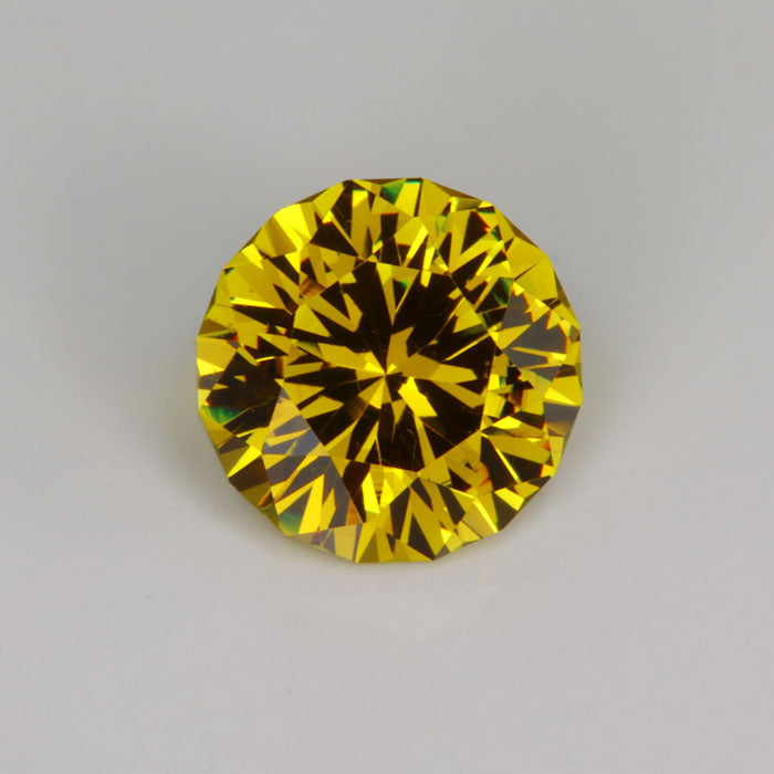 brownish yellow round brilliant mali garnet