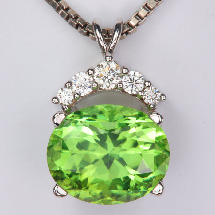 white gold oval mint peridot gemstone pendant with diamond accents
