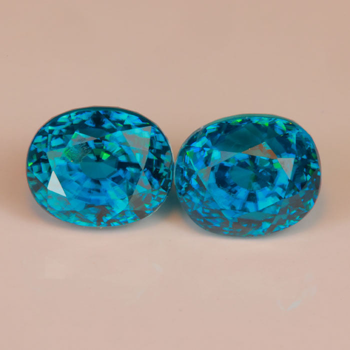 blue zircon gemstone pair greenish blue