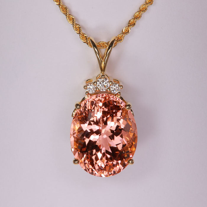peach pink orange color morganite gemstone pendant in yellow gold with diamonds