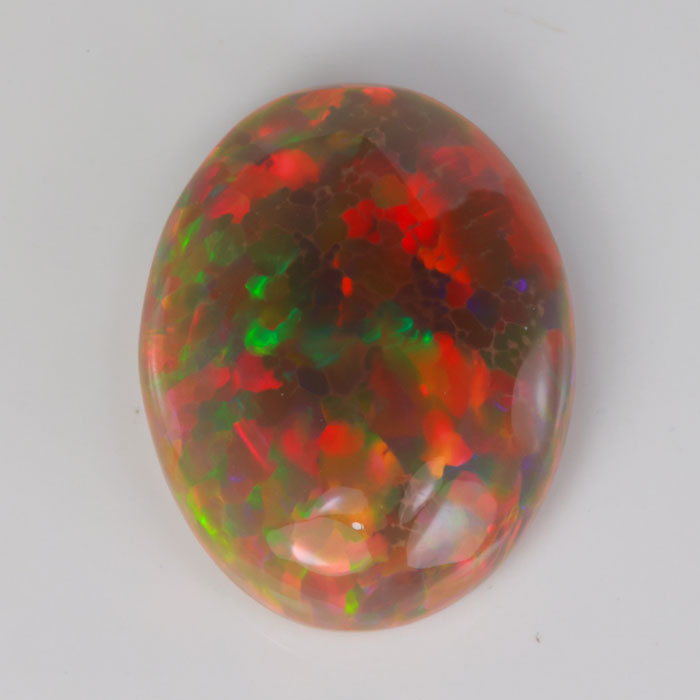 oval cabochon opal gemstone semi black color