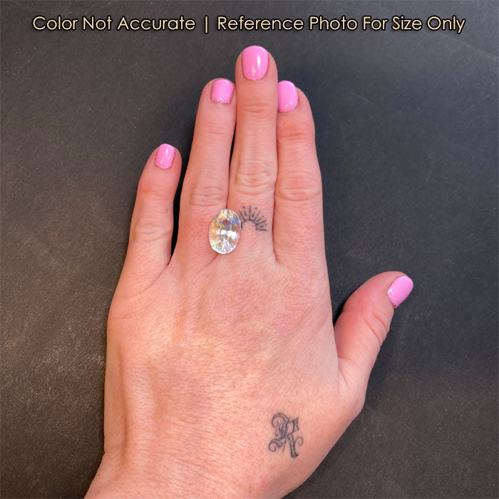 oval moonstone gemstone on hand