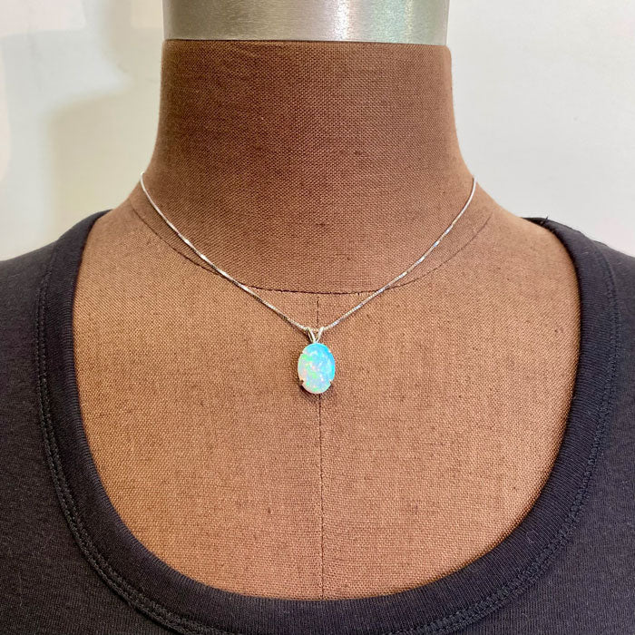 rainbow colors oval opal pendant white gold