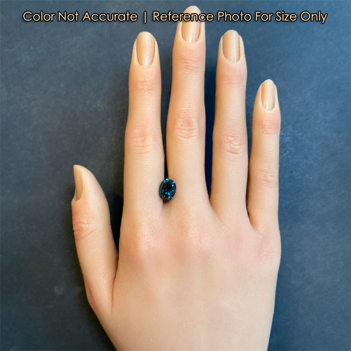 hand size to an oval sapphire gemstone