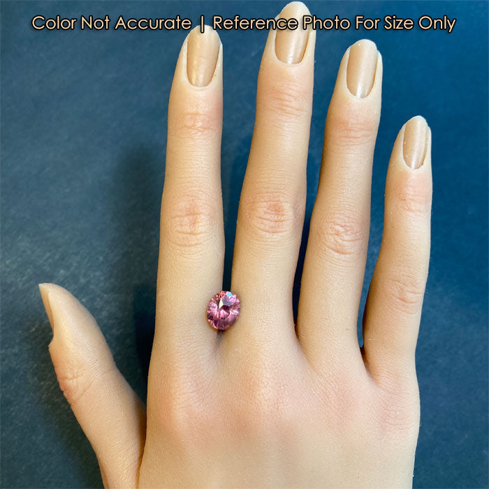 size of oval zircon on hand