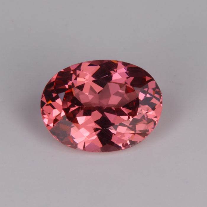 pink oval cut garnet gemstone