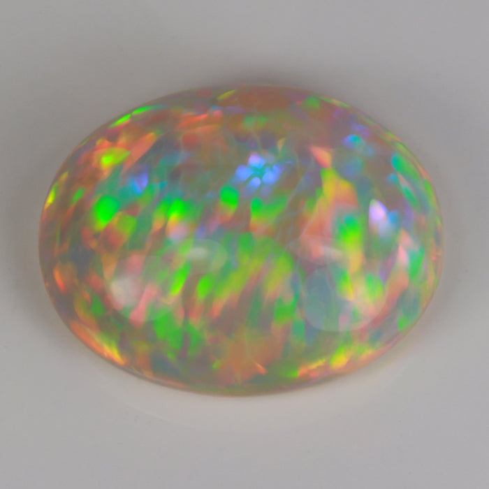 oval cabochon cut opal gemstone from ethiopia
