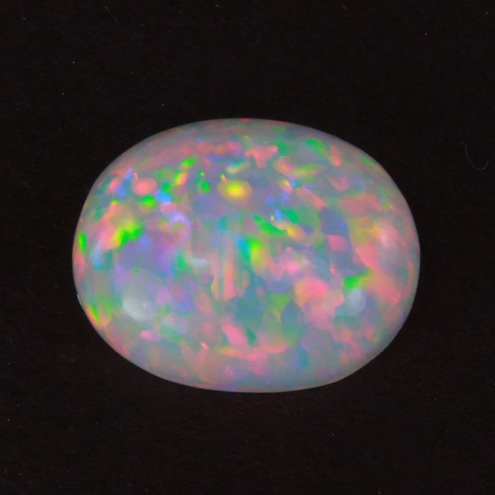 rainbow color oval cut opal gemstone