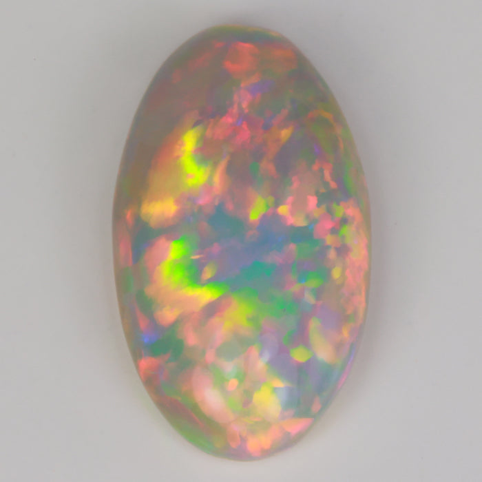 oval cut rainbow opal gem