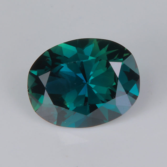 blue green oval cut natural sapphire gemstone