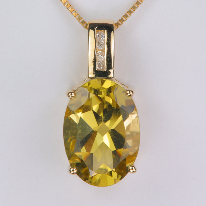 estate yellow gold and oval cut greenish yellow citrine gemstone pendant with diamonds