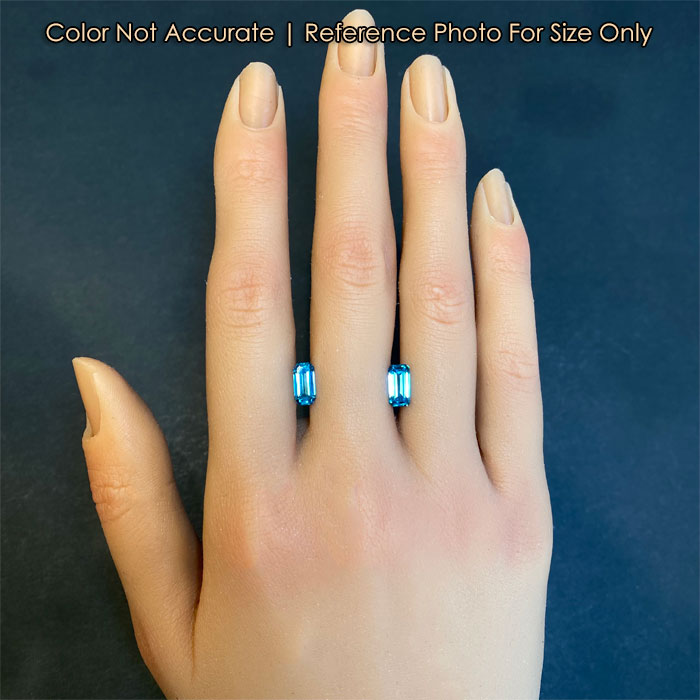 emerald cut blue zircons on hand for size
