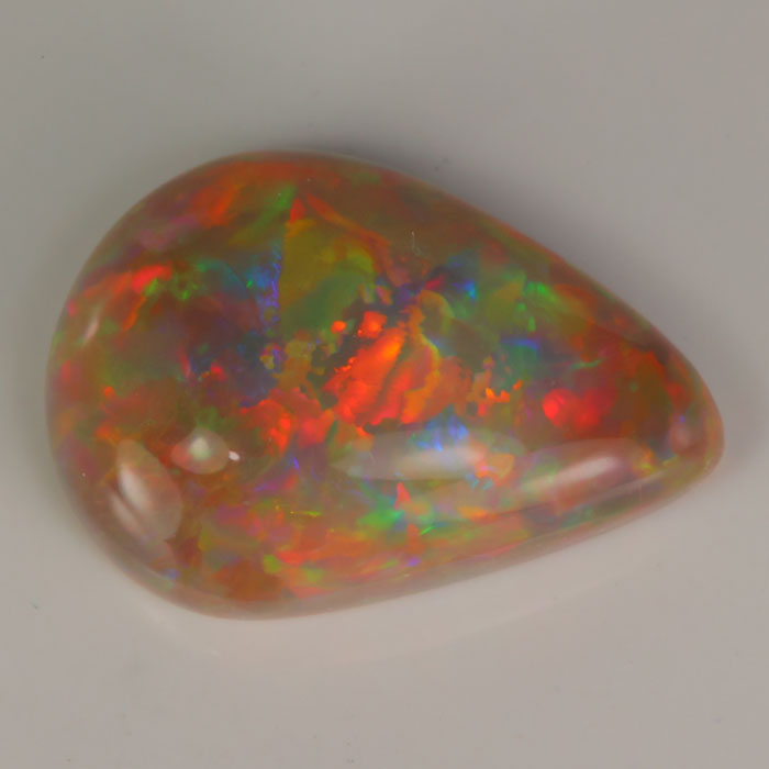 semi black color pear cabochon opal gem