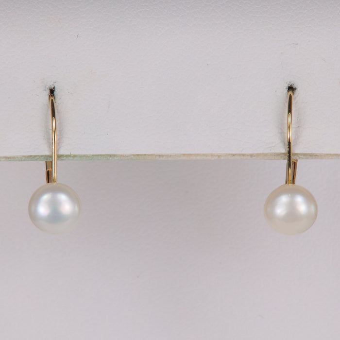 yellow gold freshwater button pearl earrings hinged back