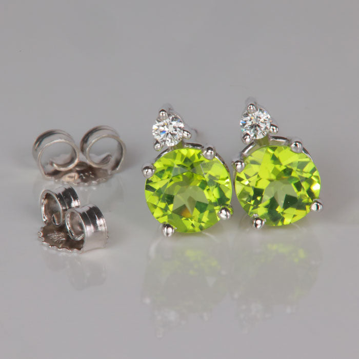 white gold earrings with peridot gemstone and diamonds