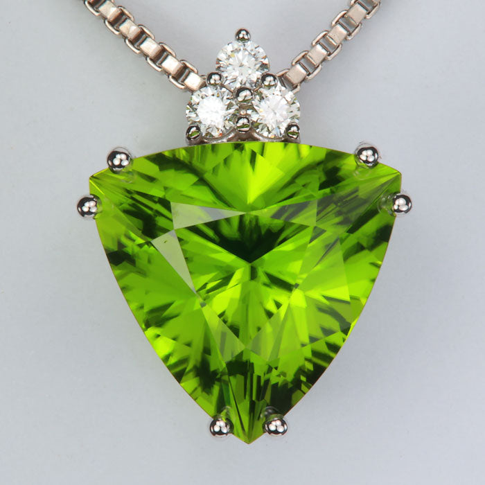 white gold diamond accented peridot gemstone pendant