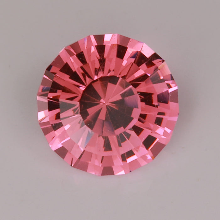 brownish pink round brilliant malaya garnet gemstone