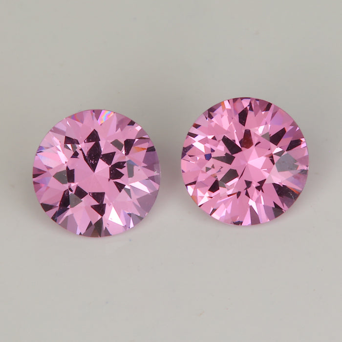round brilliant cut pink spinel gemstone pair