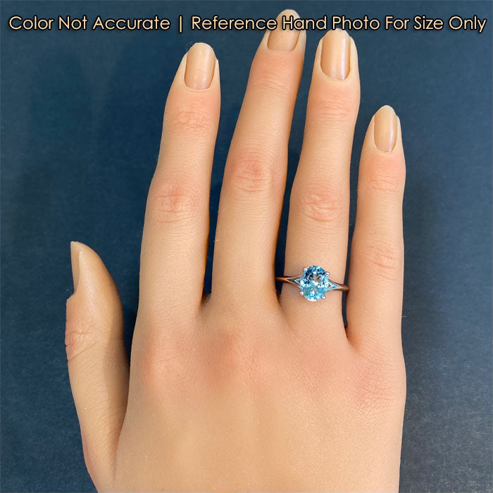 aquamarine ring on hand