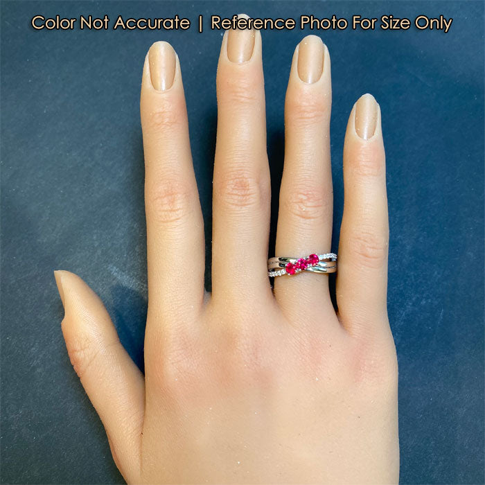 ruby ring in platinum with diamonds on hand