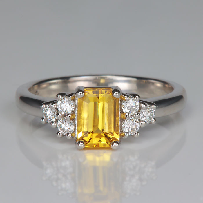 emerald cut golden beryl heliodor gemstone ring in platinum with diamonds