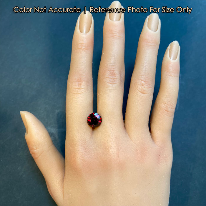natural red color zircon gem size to hand
