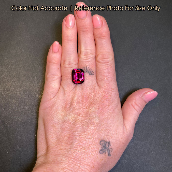 size of rhodolite garnet to a hand