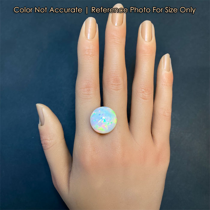 opal gem round cut on hand for size