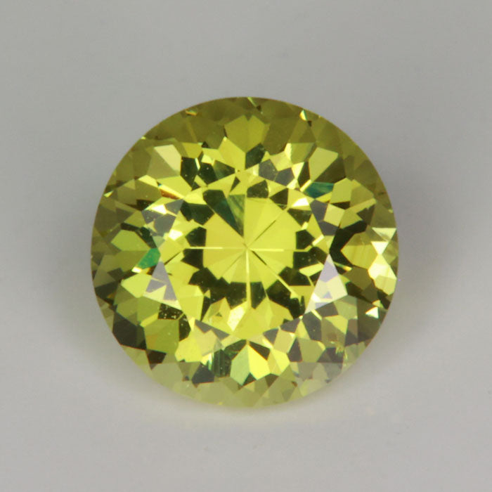 yellowish green round brilliant cut mali garnet gemstone