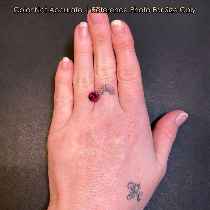 violet red round brilliant umbalite garnet size
