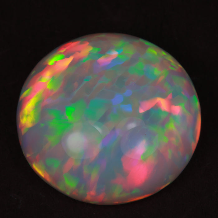 opal gemstone round cabochon cut from ethiopia