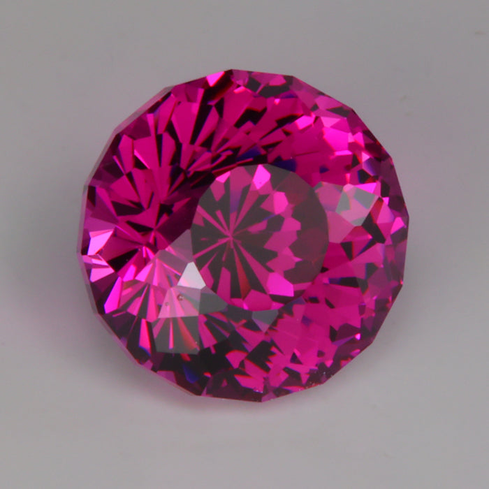 pinkish violet round portuguese cut garnet gemstone