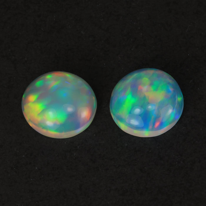 rainbow color round cabochon cut opal gemstone pair