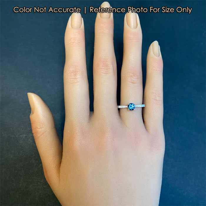 greenish blue sapphire gemstone ring with diamonds