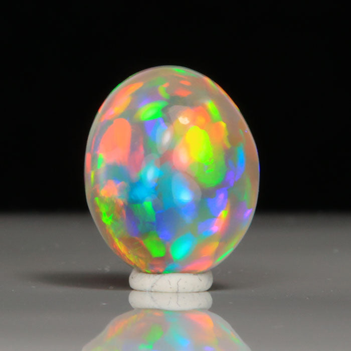 opal gemstone oval cabochon semi black