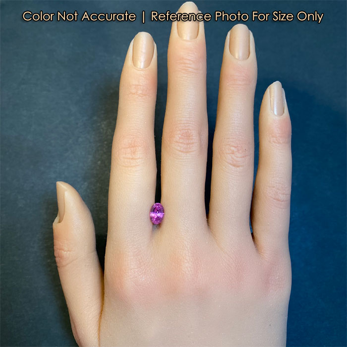 pink oval sapphire gemstone size to a hand