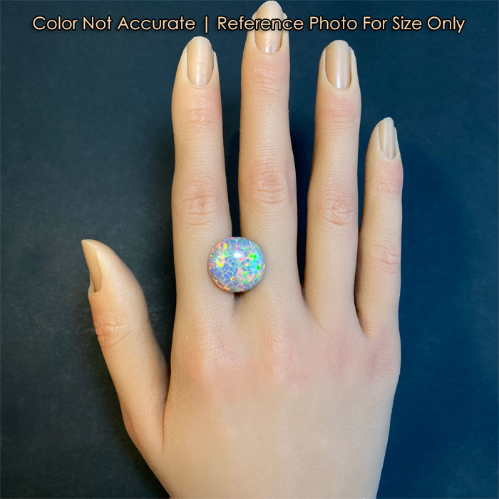 size on hand of round cabochon opal gem