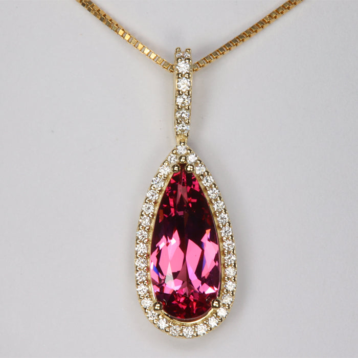 pink spinel pendant in yellow gold with diamonds