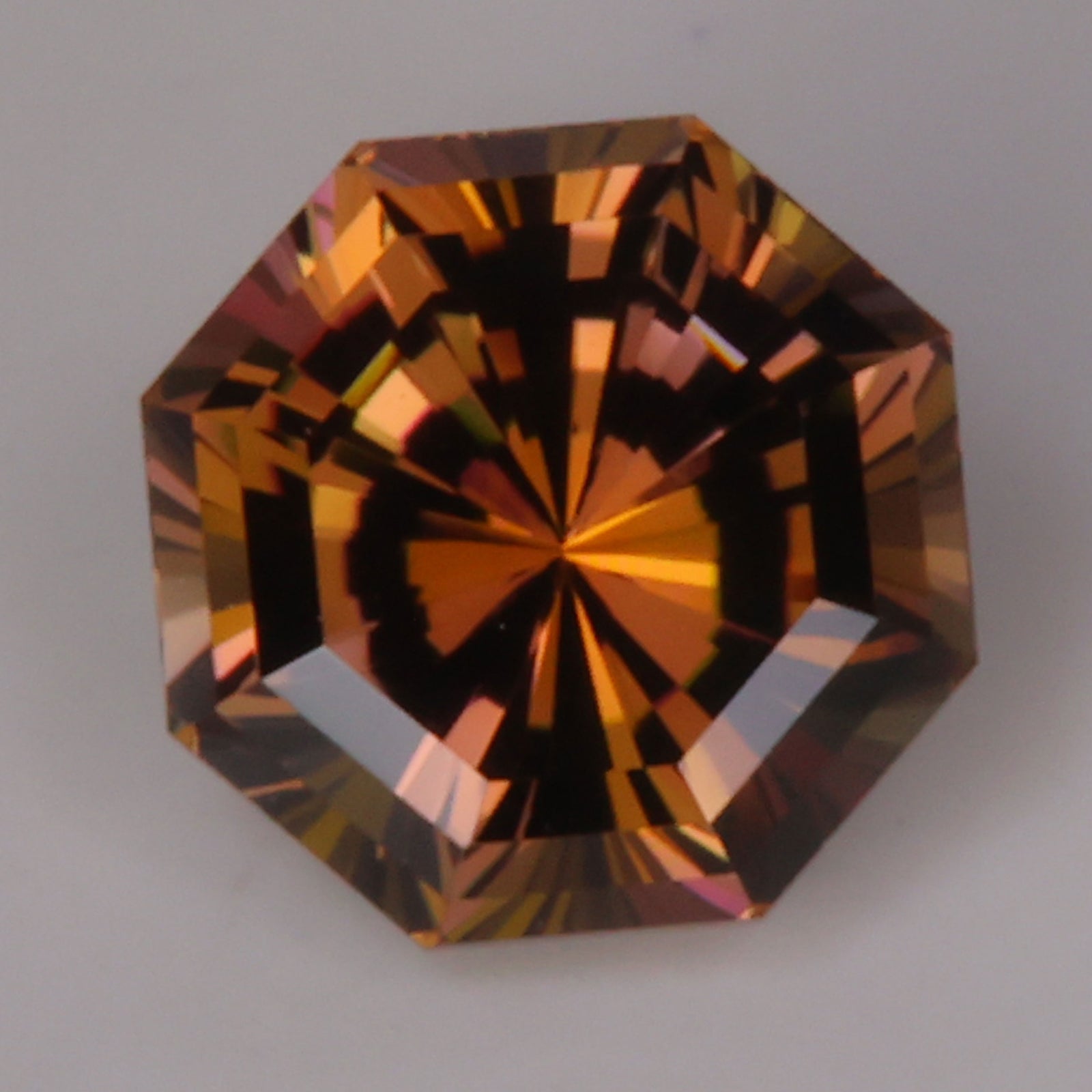 tanzanite octagonal brilliant gem before heat