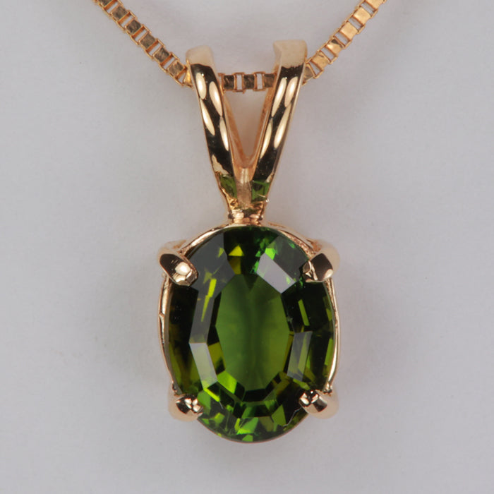 yellow gold and oval cut tourmaline gemstone pendant