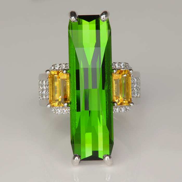 platinum ring with tourmaline gemstone and heliodor with diamonds