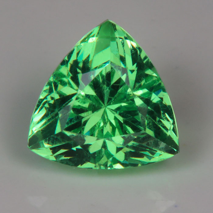 green garnet gemstone trilliant cut