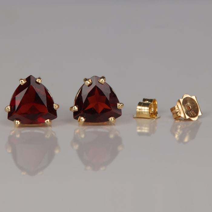 deep red garnet gemstone earrings in yellow gold