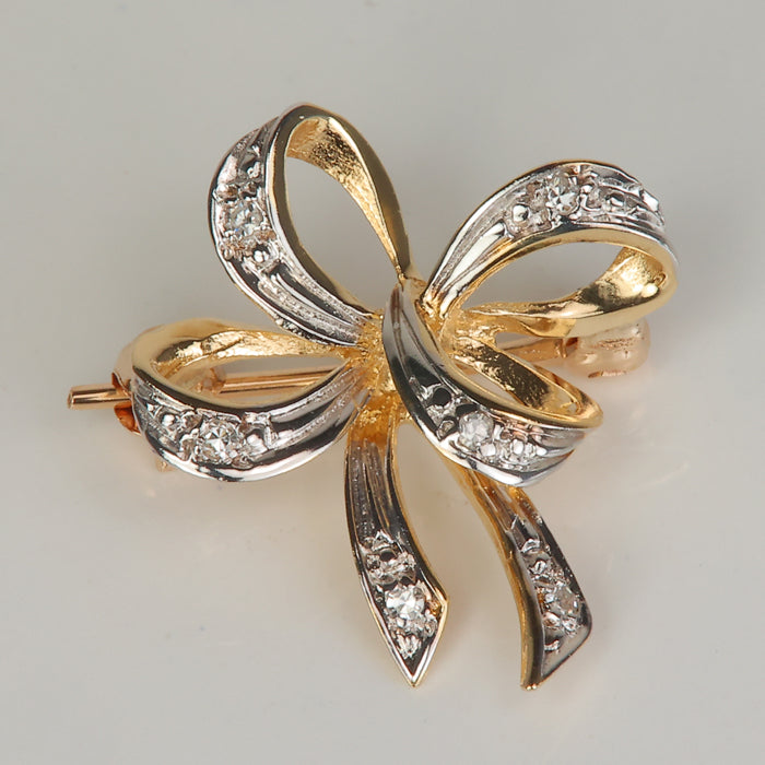 yellow gold two tone diamond accented bow pin