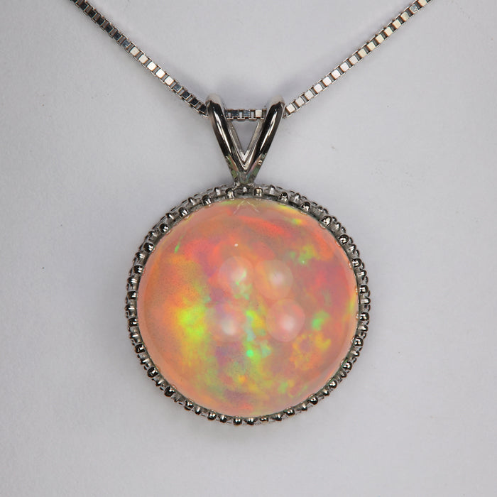 white gold round opal pendant