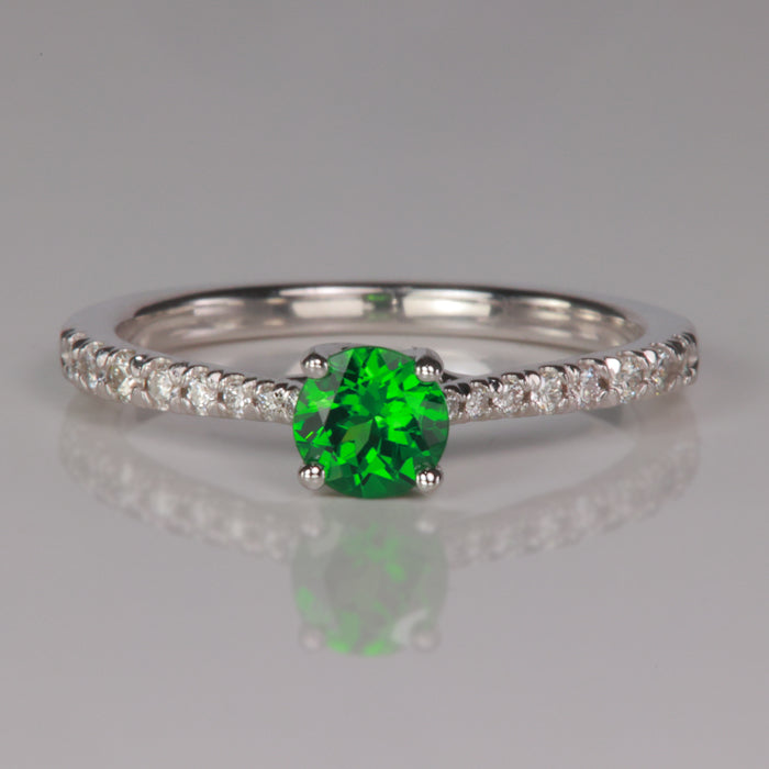 green tsavorite garnet gemstone ring with diamonds in white gold