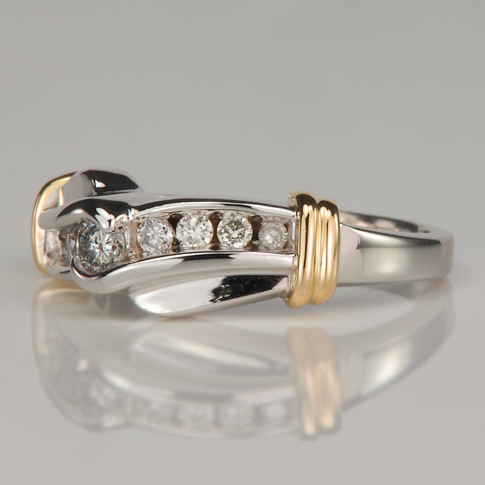 white and yellow gold diamond ring