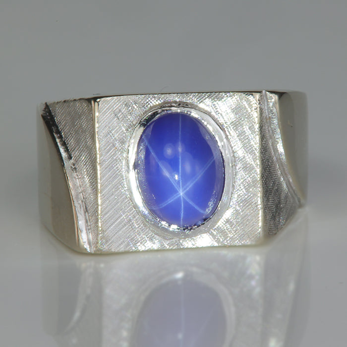 florentine finish on white gold synthetic star sapphire ring