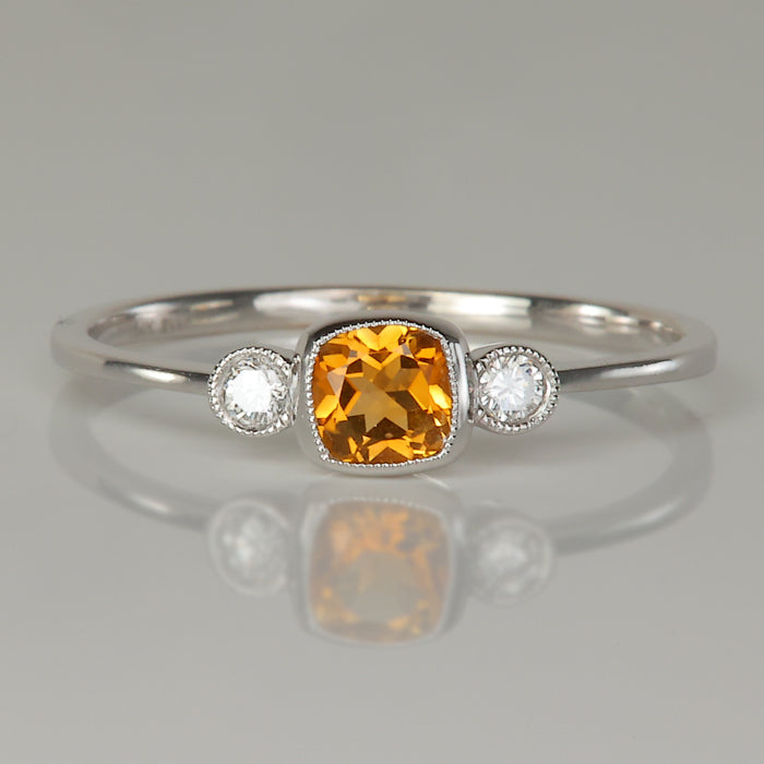 white gold ring with citrine gem and diamond accent
